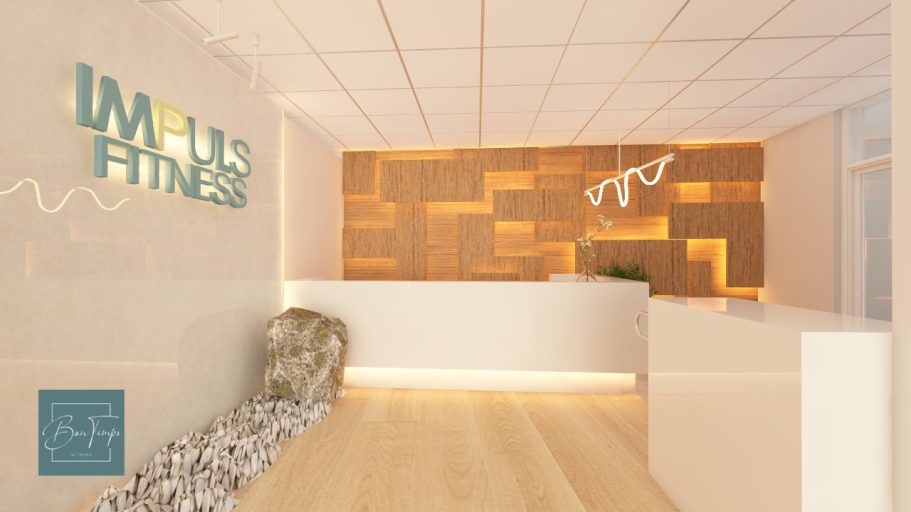 Moderne Empfangshalle eines Fitnessstudios mit hellen Holzelementen und einem Empfangstresen.