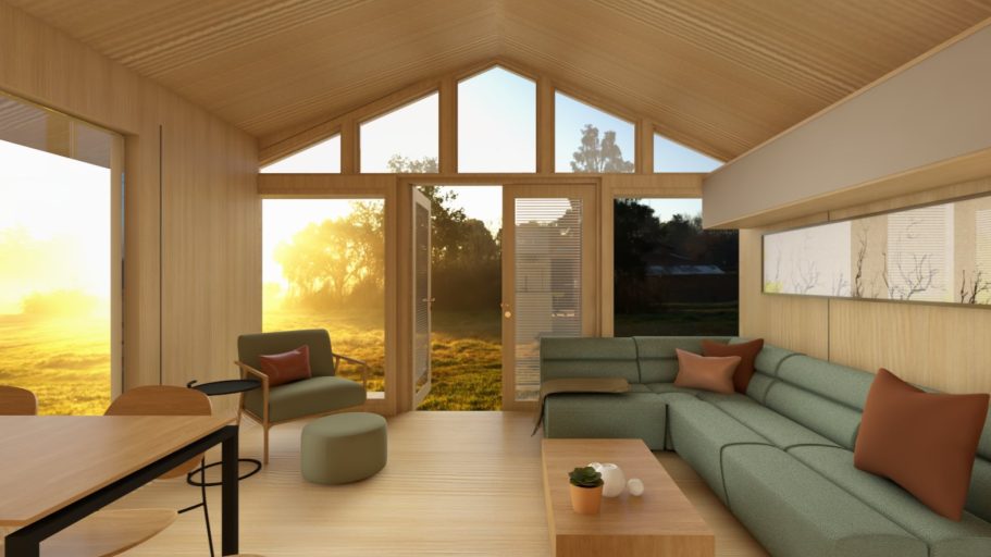 Moderne Inneneinrichtung mit großen Fenstern, Sofas und Blick auf eine sonnige Landschaft.